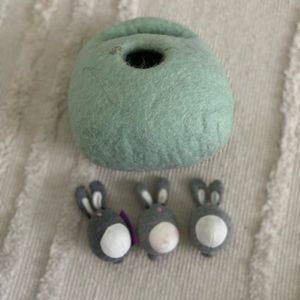 Lovevery Bunnies in a felt burrow